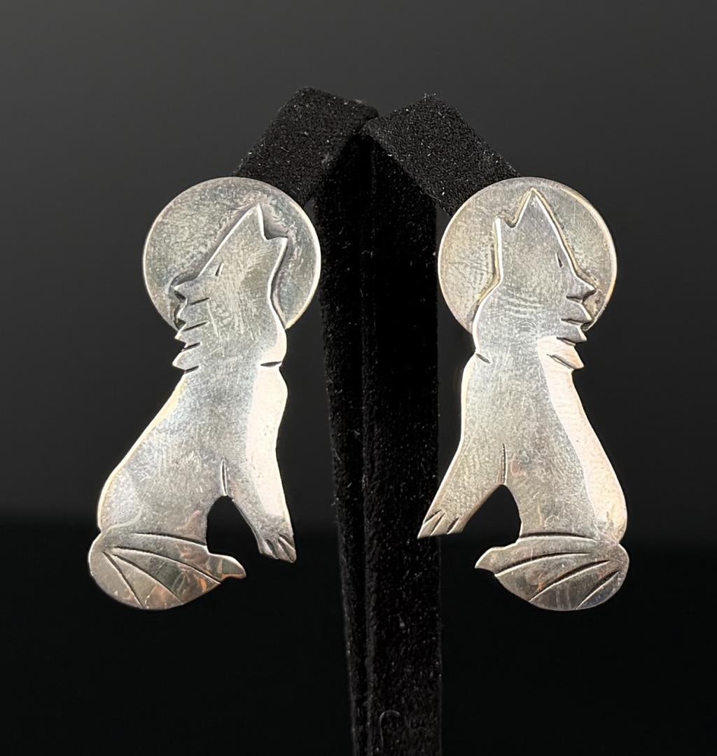 Sterling Silver Howling Wolf Earrings: 1 1/2" by 7/8". 6.96 grams.
