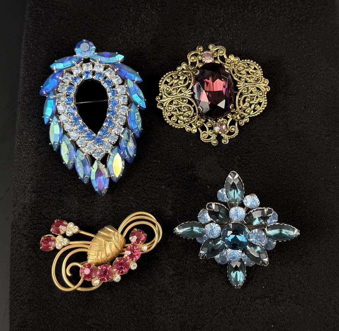 Rhinestone Costume Jewelry Brooches: Largest is 2 1/4". One is signed Sarah Coventry.