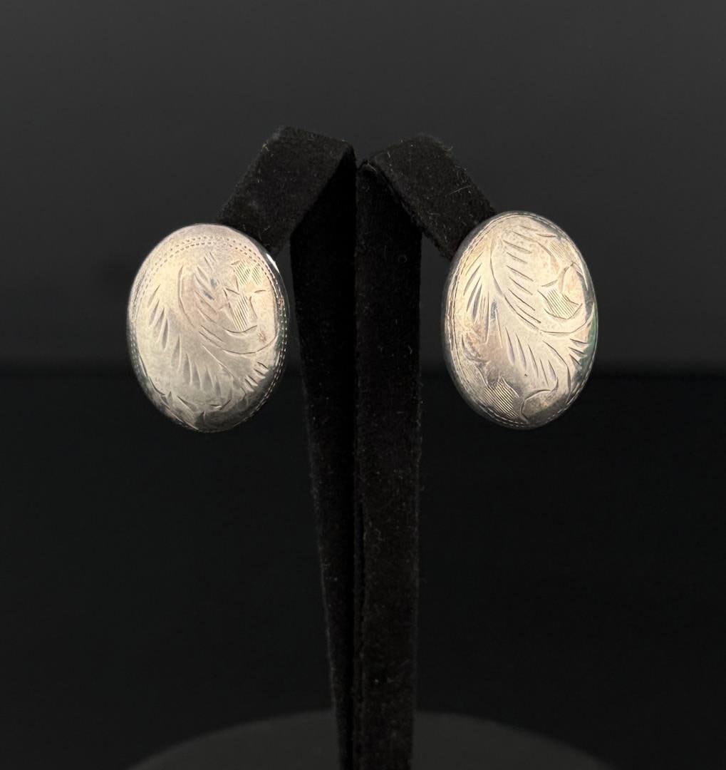 Cowgirl Sterling Silver Earrings: 5.83 grams, 7/8" long.