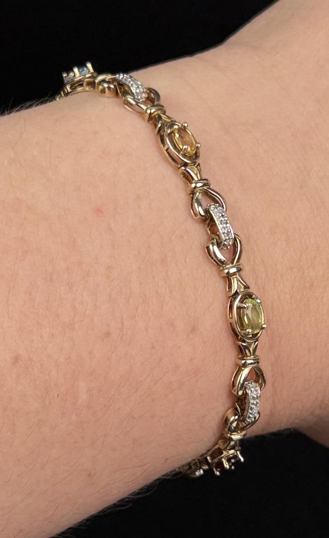 Sterling Silver Gemstone Tennis Bracelet: 8.33 grams, 7" inner circumference.