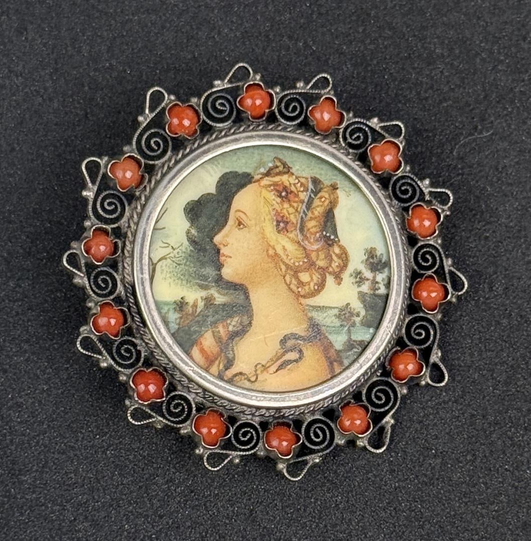 .830 Silver Porcelain Portrait Brooch: 8.11 grams, 1 5/8" diameter.