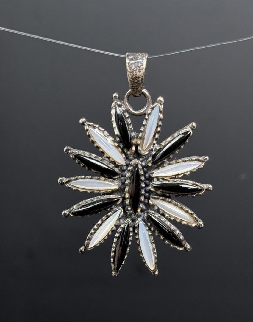 Zuni Sterling Silver Petit Point Pendant: 10.36 grams, 1 7/8" long.
