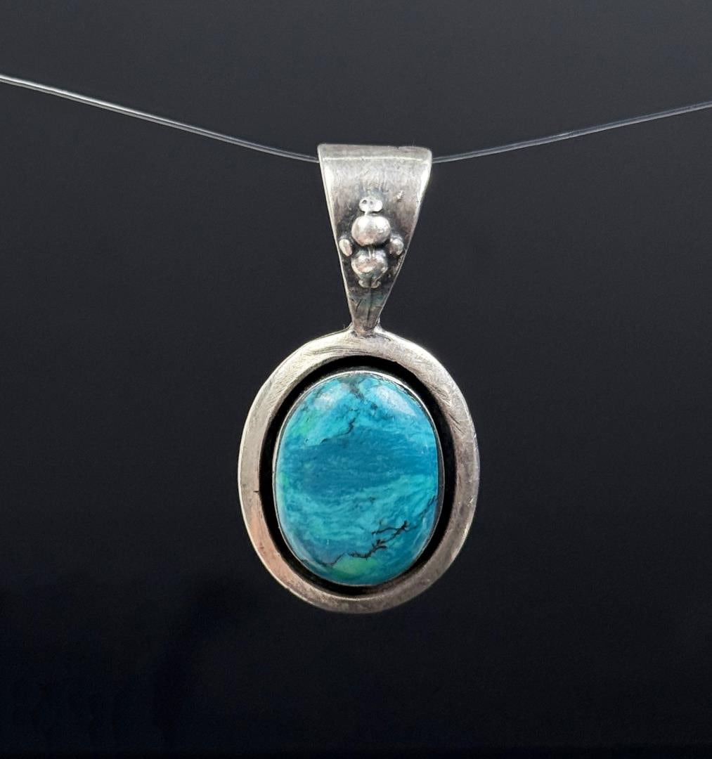 Ted Ott Sterling Pendant: 9.01 grams. 1 1/2" long.