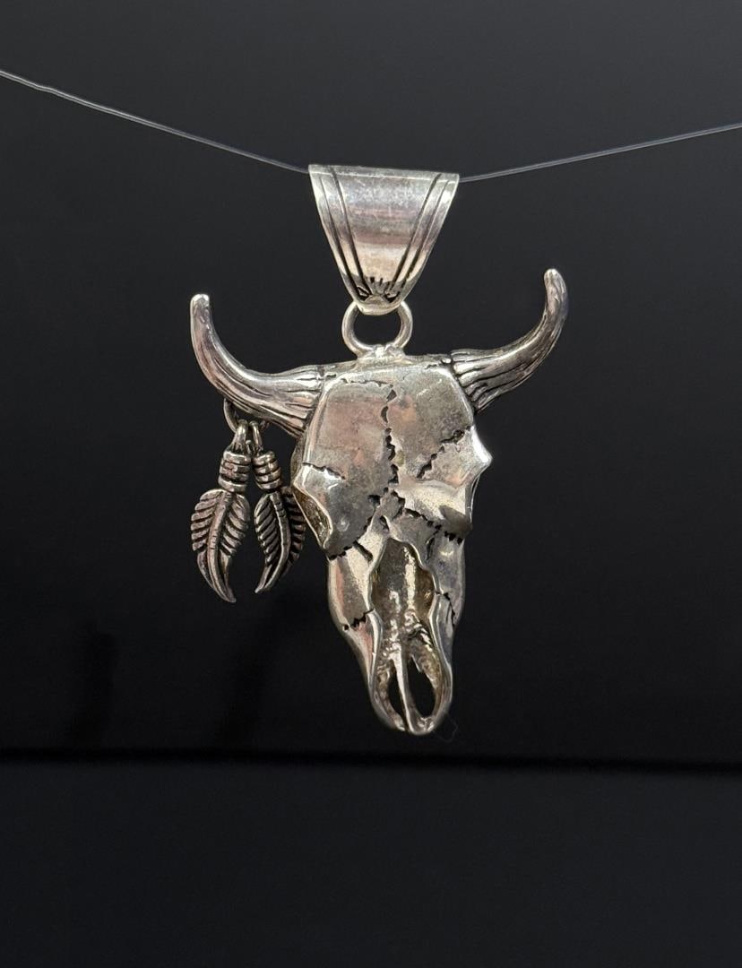 Sterling Silver Buffalo Skull Pendant: 18.54 grams. 2 1/4" long.