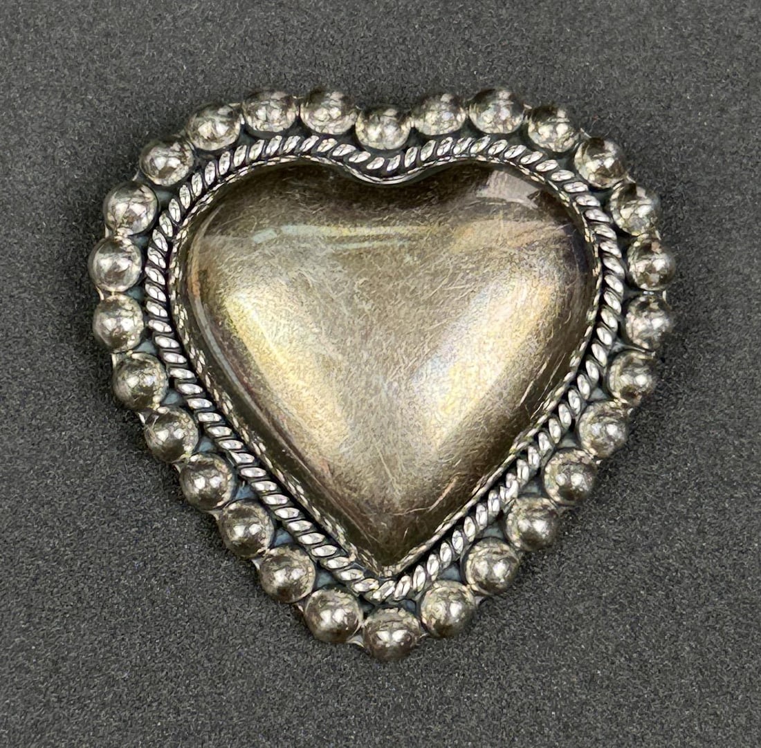 Taxco Mexico Sterling Silver Heart Brooch: 1 5/8" by 1 5/8". 22.21 grams.