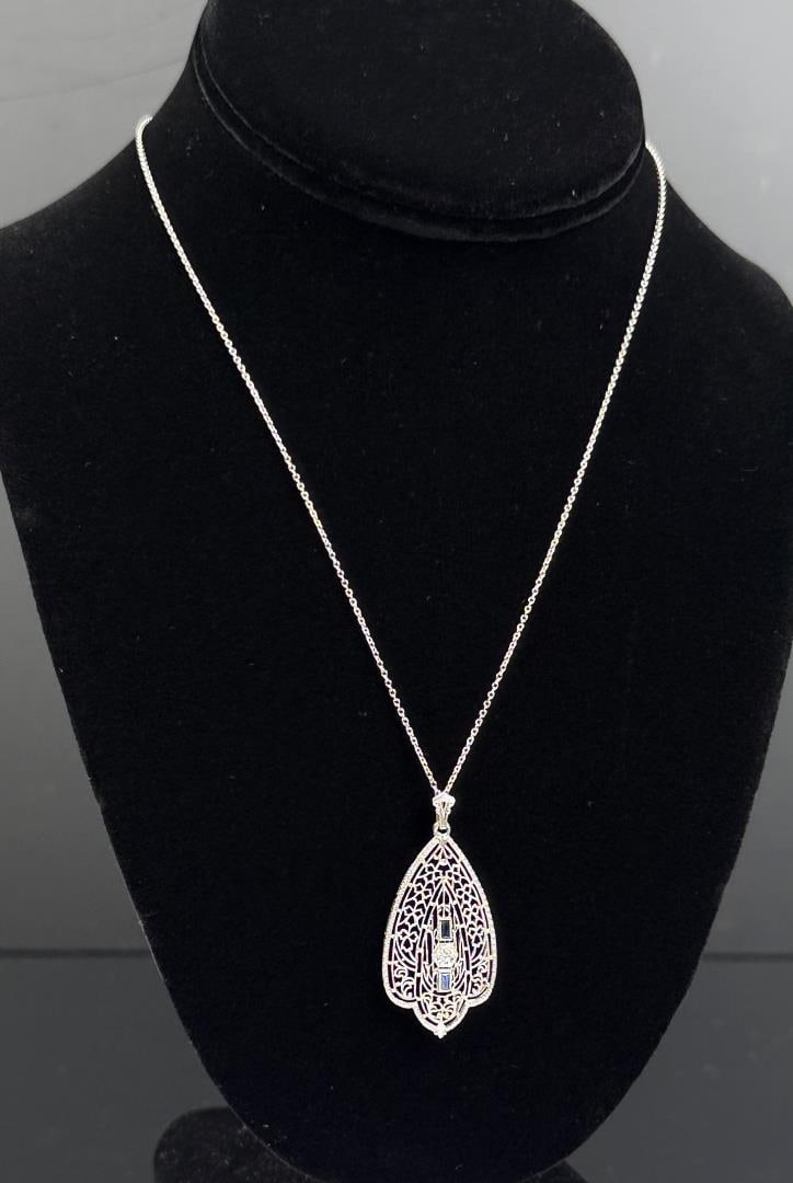 14k White Gold Filigree Diamond Sapphire Necklace: 4 grams total weight. Measures 10" long closed with pendant. This lot requires payment via non credit card only.