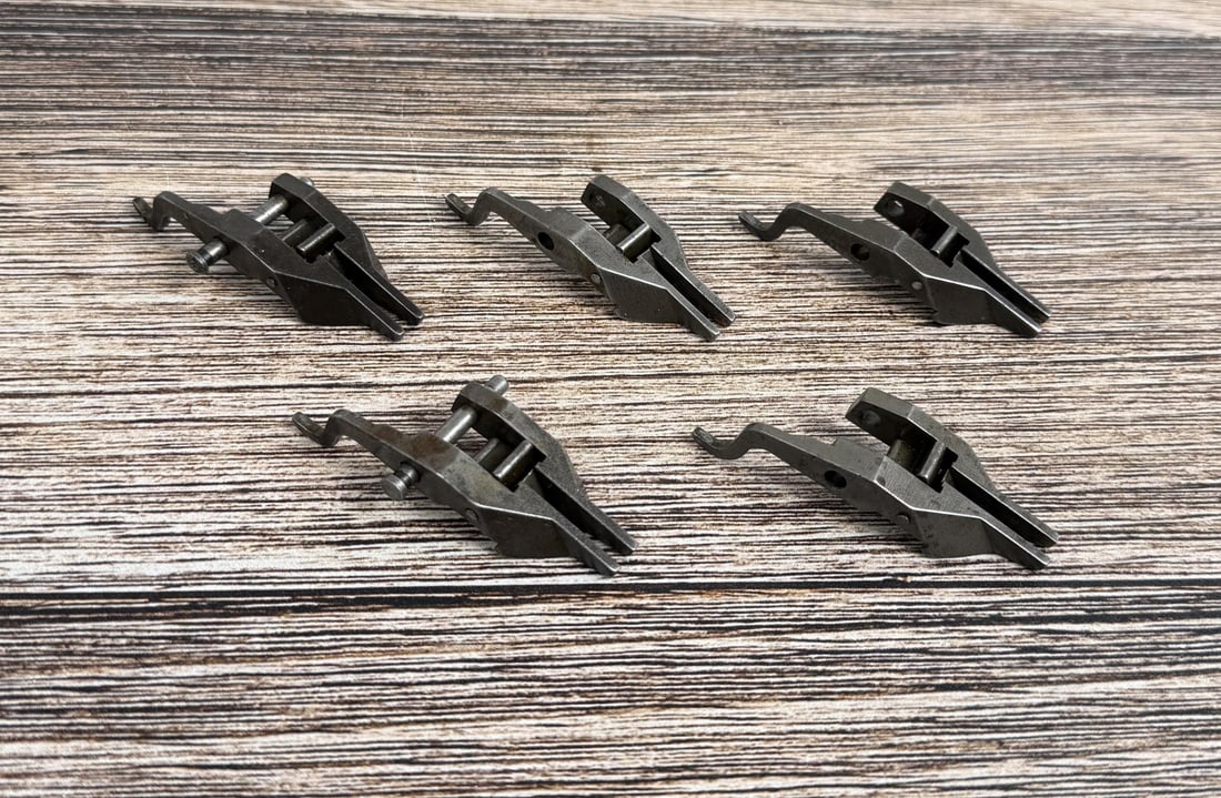 M1 Garand Operating Rod Catch: Nice grouping. 2 are marked 'H", 2 are marked "G", 1 is marked "l"