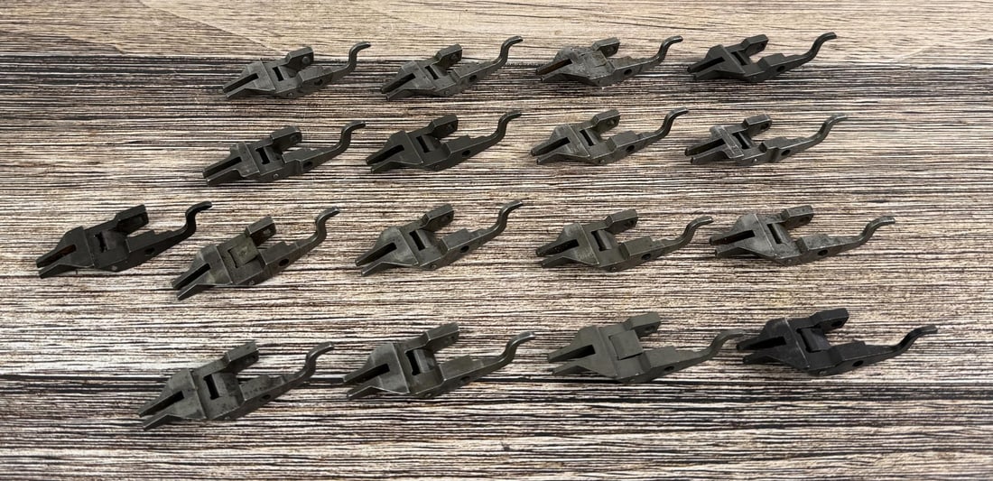 M1 Garand Operating Rod Catch: Lot of 17. 2 are marked "A", 1 is marked "PB", the other 14 are unmarked.