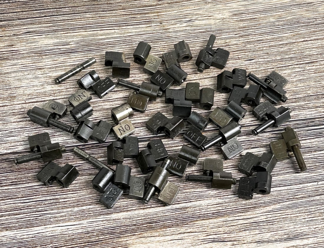 Springfield 1903 1903a3 Cut Offs: 33 total. 12 are marked "R", 5 are marked "N". 1 is marked "G", 2 are marked "B", 4 are marked "CC", and 9 are unmarked.