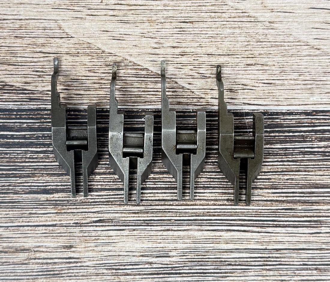 M1 Garand Operating Rod Catch: Nice grouping, 1 each of the following markings; "F", "B", "C", and "B" with crescent.