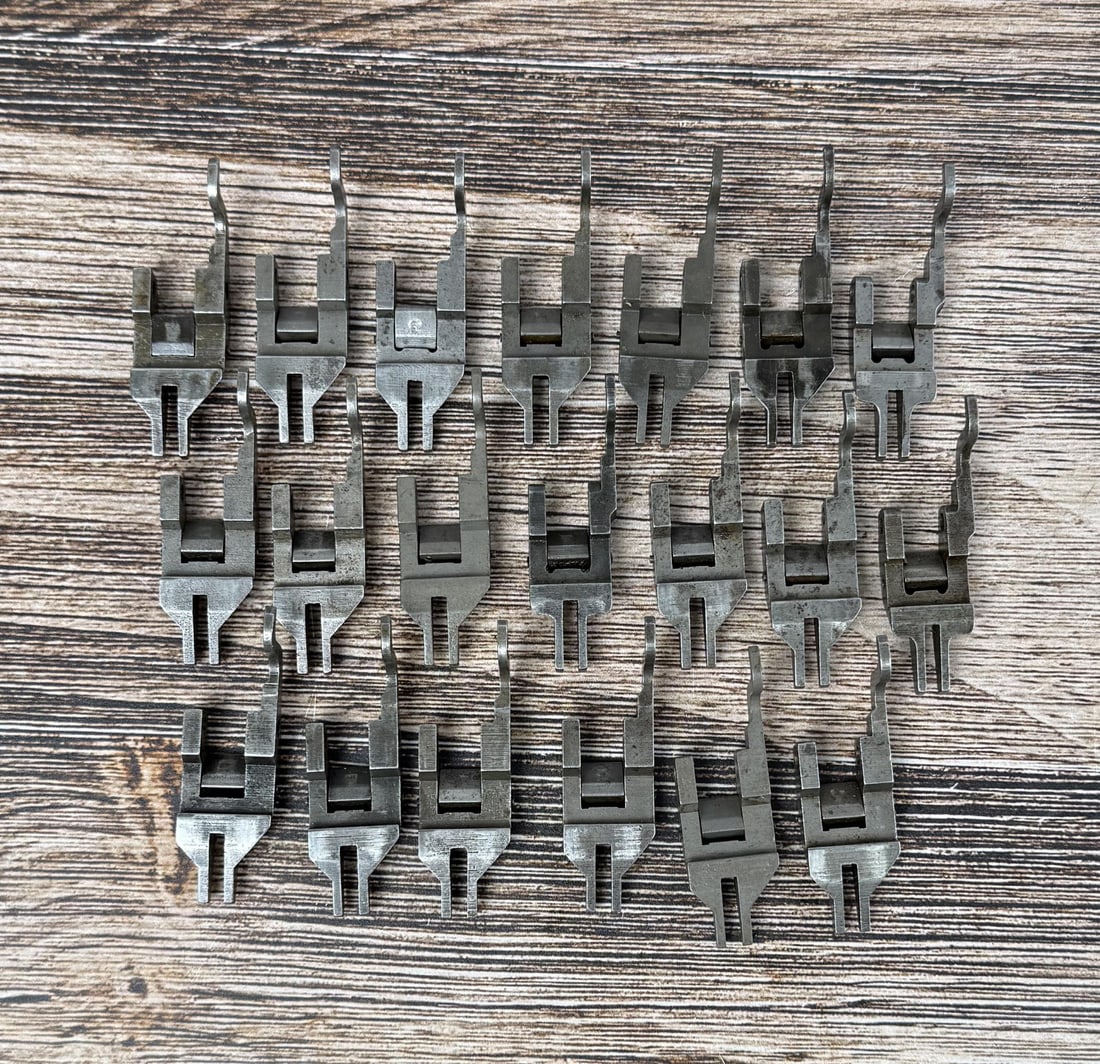 M1 Garand Operating Rod Catch: 20 total. 1 is marked "A", the rest are unmarked.