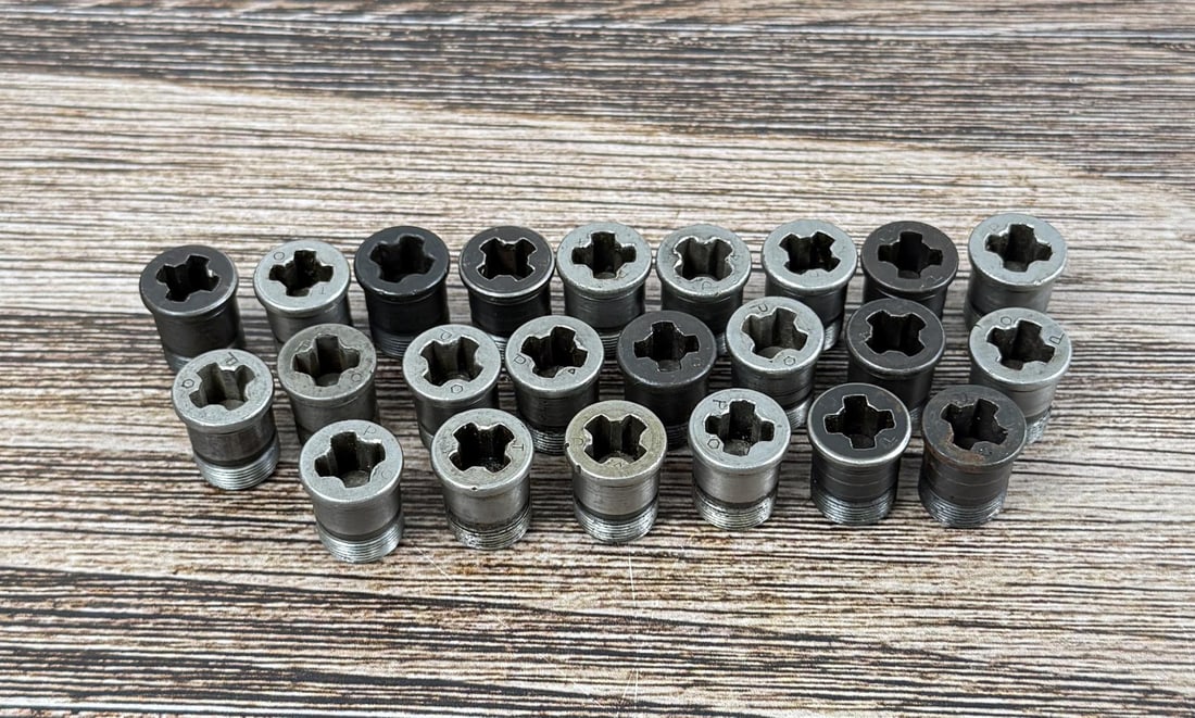 M1 Garand Gas Cylinder Lock Screws: 23 total. The following markings are present: -5x "P" with triangle -1x "P" -1x "TO" -2x "PX" -11x "P" with hexagon -1x "P" with 2 crescents -1x "T PAX" -1x "O"