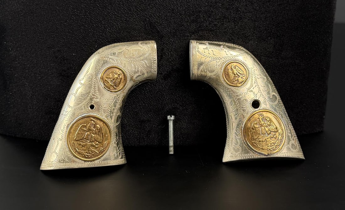 Mexico Sterling 10k Gold Colt Single Action Grips: Single Action Army. Eagle Pattern. Sterling Silver and 10k Gold. 86.84 grams total weight.