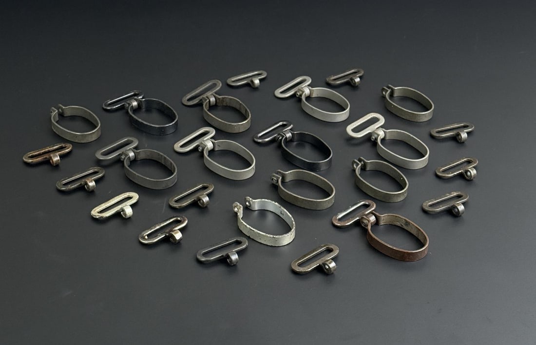 Springfield 1903a3 Barrel Bands: 12 total with extra parts. There are 14 sling swivels marked with "R". The rest of the parts are unmarked.