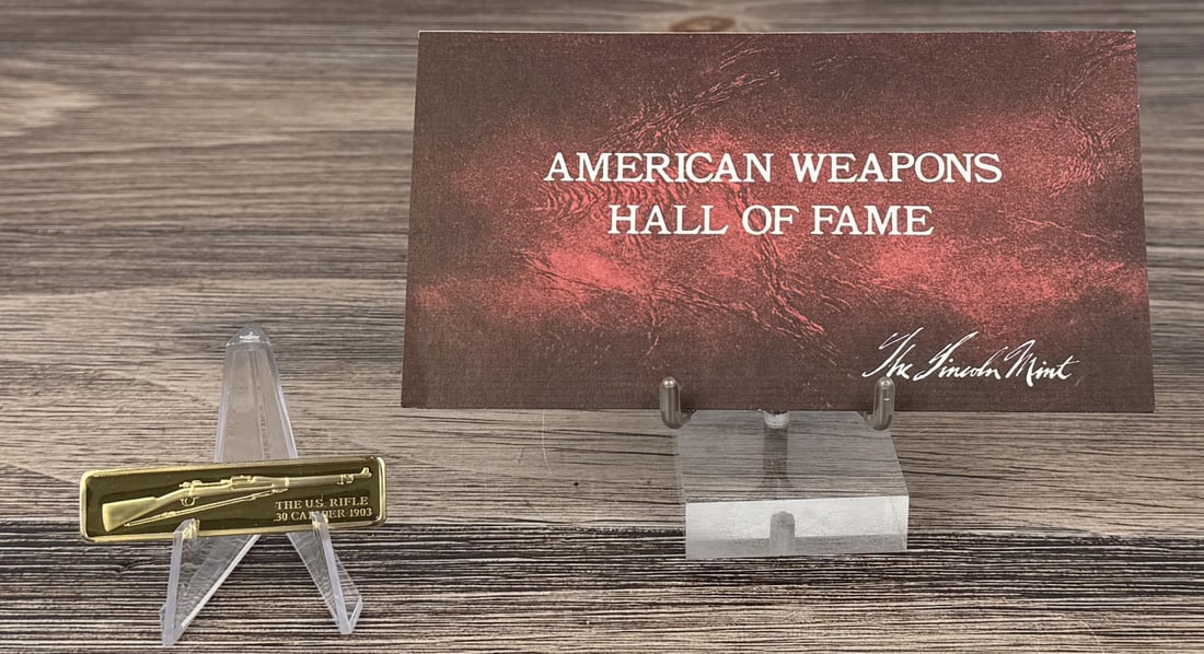 Lincoln Mint 1oz Sterling Silver Bar: Issue No. 21 of the American Weapons Hall of Fame by the Lincoln Mint. The U.S. Rifle .30 Cal, Model of 1903. 31.23 grams of 24K Gold Plated Silver. Measures 2 1/2" by 5/8"