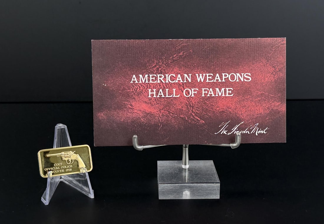 Lincoln Mint 1928 Colt Revolver 1oz Silver Bar: Issued in the American Weapons Hall of Fame series by the Lincoln Mint. Colt Official Police Revolver 1928. 32.84 grams of 24K Gold Plated Silver. Measures 1 5/8" by 7/8"