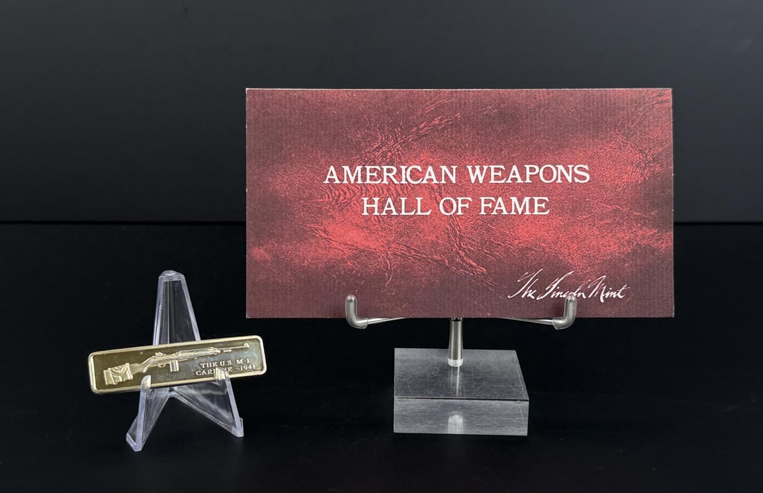 Lincoln Mint 1941 M1 Carbine 1oz Silver Bar: Issue No. 15 of the American Weapons Hall of Fame by the Lincoln Mint. The United States Cal. 30, M-1 Carbine, Model of 1941. 30.44 grams of 24K Gold Plated Silver. Measures 2 3/8" by 5/8"