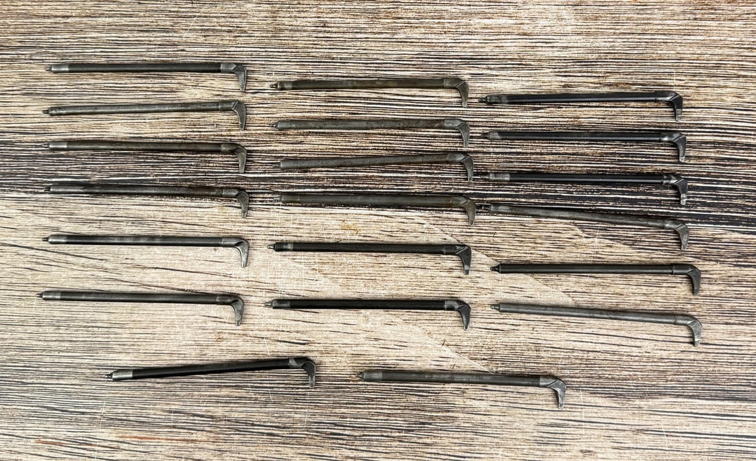 M1 Garand Firing Pins: 20 total. 2 are marked "PB", the rest are unmarked.