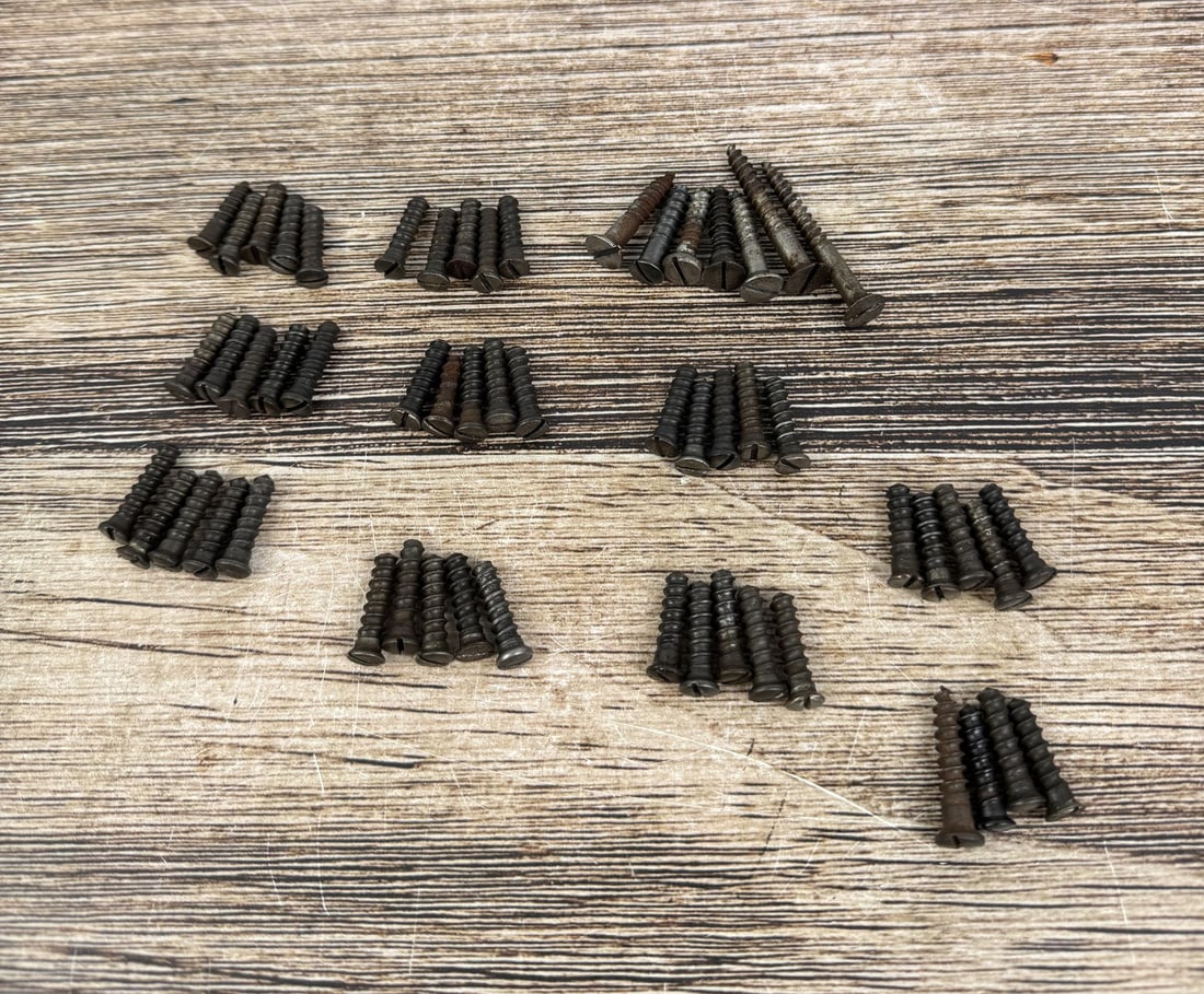 Blued Springfield 1903 1903a3 Buttplate Screws: 49 small, 7 large.