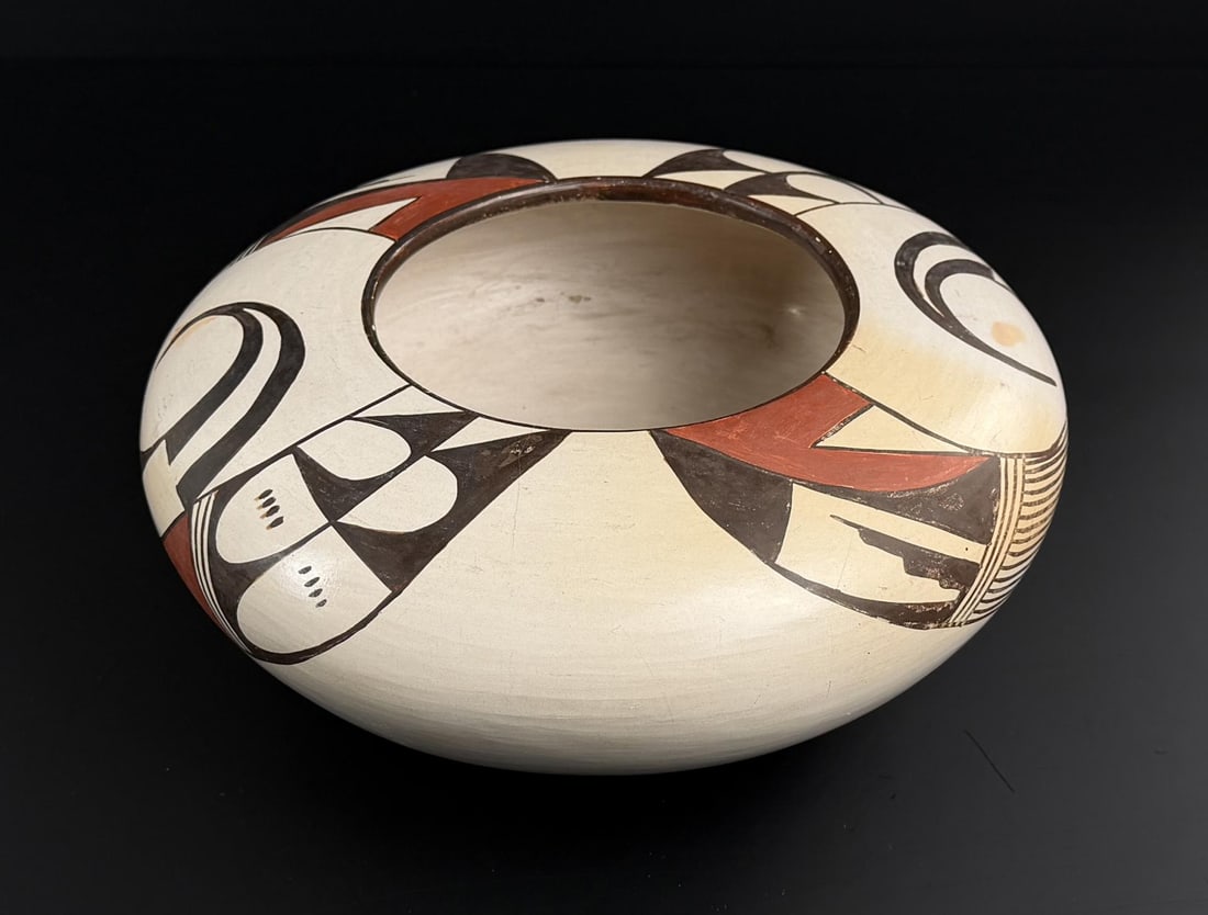 Signed Hopi Indian Pottery Jar: 9 3/8" diameter, 4" tall. Cracked. Signature washed out.