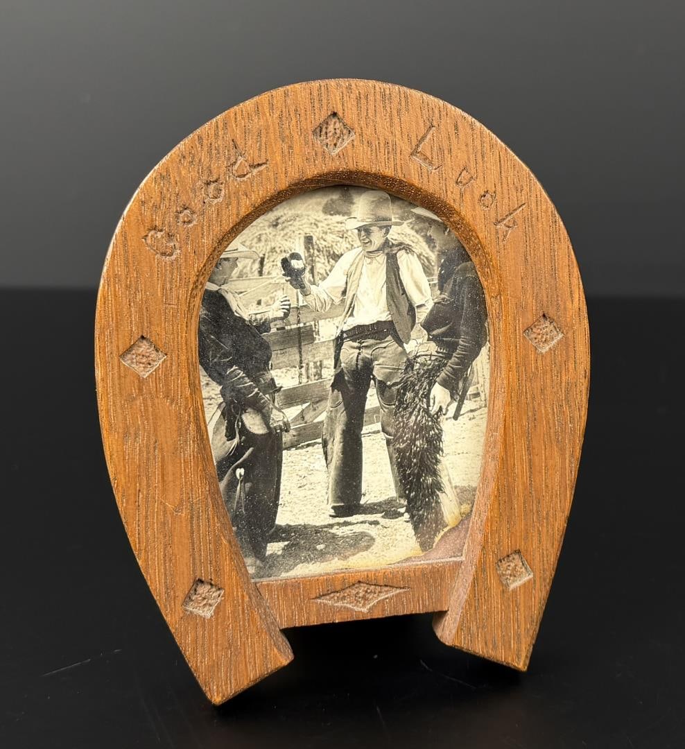 Folk Art Carved Horseshoe Cowboy Photo Frame: Includes an image of several cowboys in full outfits. 4 5/8" by 3 7/8" by 1 3/4"