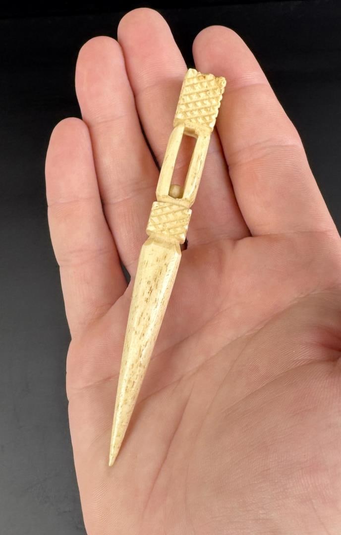 Whaler Made Whale Bone Puzzle Ball Bodkin: 4 1/4" long.