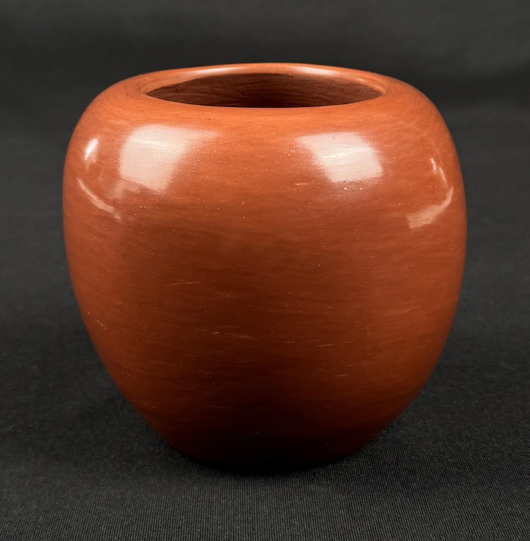 Popovi Da Santa Clara Pueblo Pottery Jar: 4 3/4" diameter, 4 1/8" tall. Popovi Da. 1923 New Mexico - 1971 Santa Fe, New Mexico. Known for: Black pottery, Indian symbolic painting. Popovi Da (Red Fox), San Ildefonso (1923-1971) is the son of f