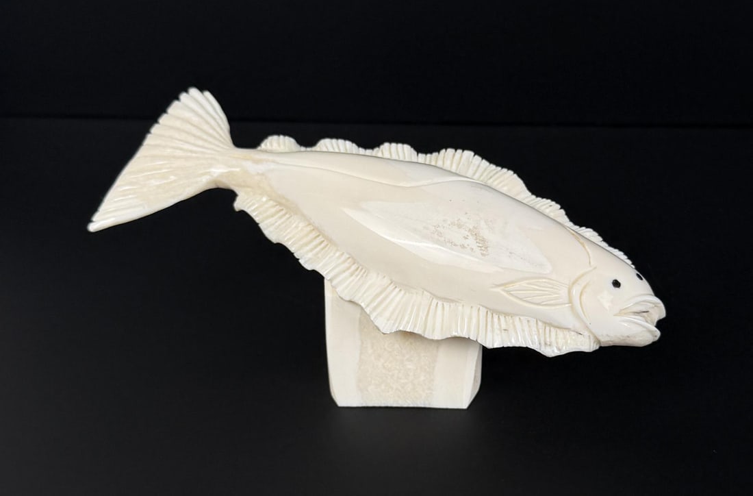 Dennis Pungowiyi Alaskan Inuit Carved Halibut: 6 1/4" by 2 1/2" by 2 1/8". Native made prior to 1972. This item cannot be shipped to Oregon, California, Hawaii, New York, New Jersey, Internationally, or any other state that prohibits.