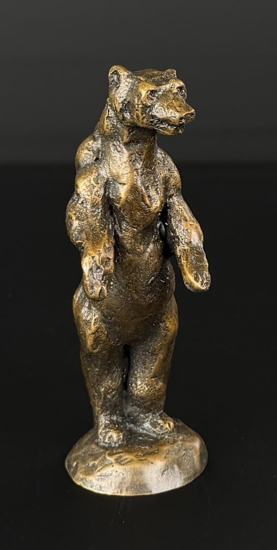 Daro Flood Alert Bear Bronze: Title is Alert Bear. 3 5/8" by 1 3/8" by 1 3/8". 3/30. Daro Flood (1954 - 2017) was active/lived in Arizona. Daro Flood is known for Portrait bust Indian and cowboy sculpture. Daro Flood was a