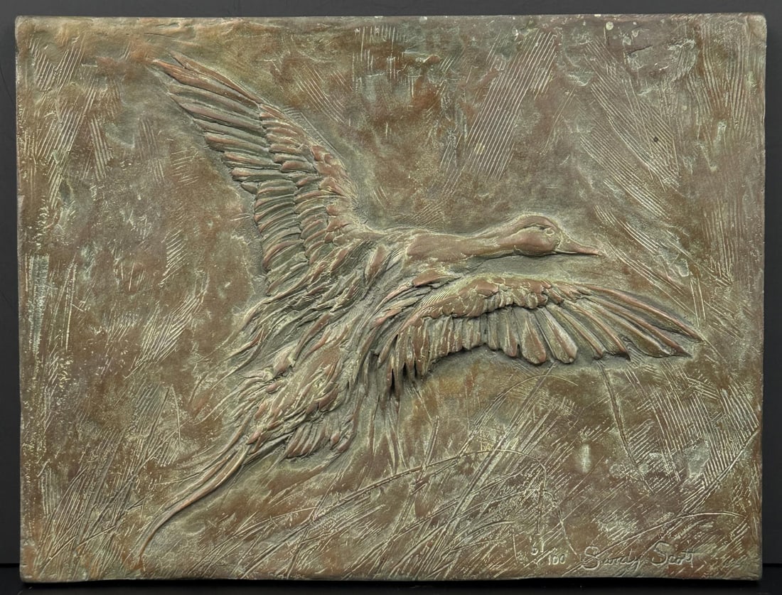 Sandy Scott Mallard Relief Bronze: Title is Mallard Relief. 11 1/4" by 8 7/8" by 1". 51/100. Sandy Scott (Born 1943) is active/lives in Colorado, Ontario / Canada. Sandy Scott is known for Animal sculpture, sport scene etching. Born