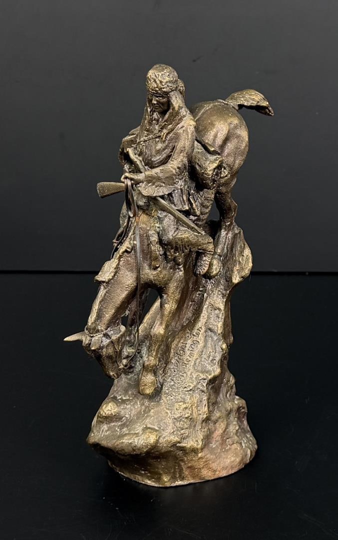 Frederic Remington Mountain Man Bronze: Title is Mountain Man. Measures 7" by 4 /12" by 2 1/2".