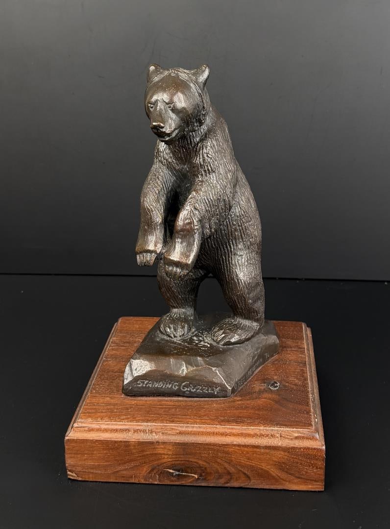 Ace Powell Standing Grizzly Bear Bronze: Title is Standing Grizzly. 11" by 7" by 7". Rex Breneman Foundry. Numbered 14/30. Ace (Asa Lynn) Powell (1912 - 1978) was active/lived in Montana, New Mexico. Ace Powell is known for Cowboy genre and