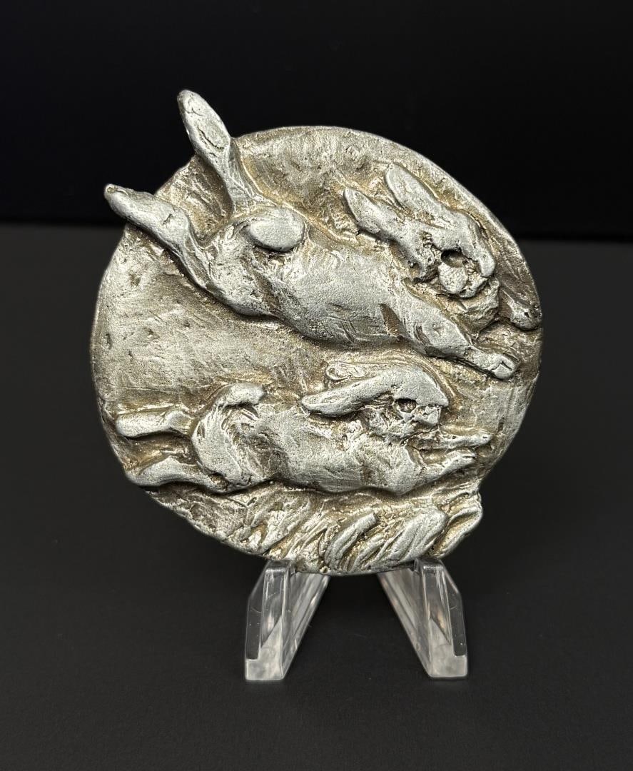 Joe Halko Prix De West Pewter Medal: 1992. 2 1/4" by 2 1/4". Joe Halko (1940 - 2009) was active/lived in Montana. Joe Halko is known for Wildlife sculpture, dioramist, landscape painting. Joe Halko grew up a student of nature of a ranch 