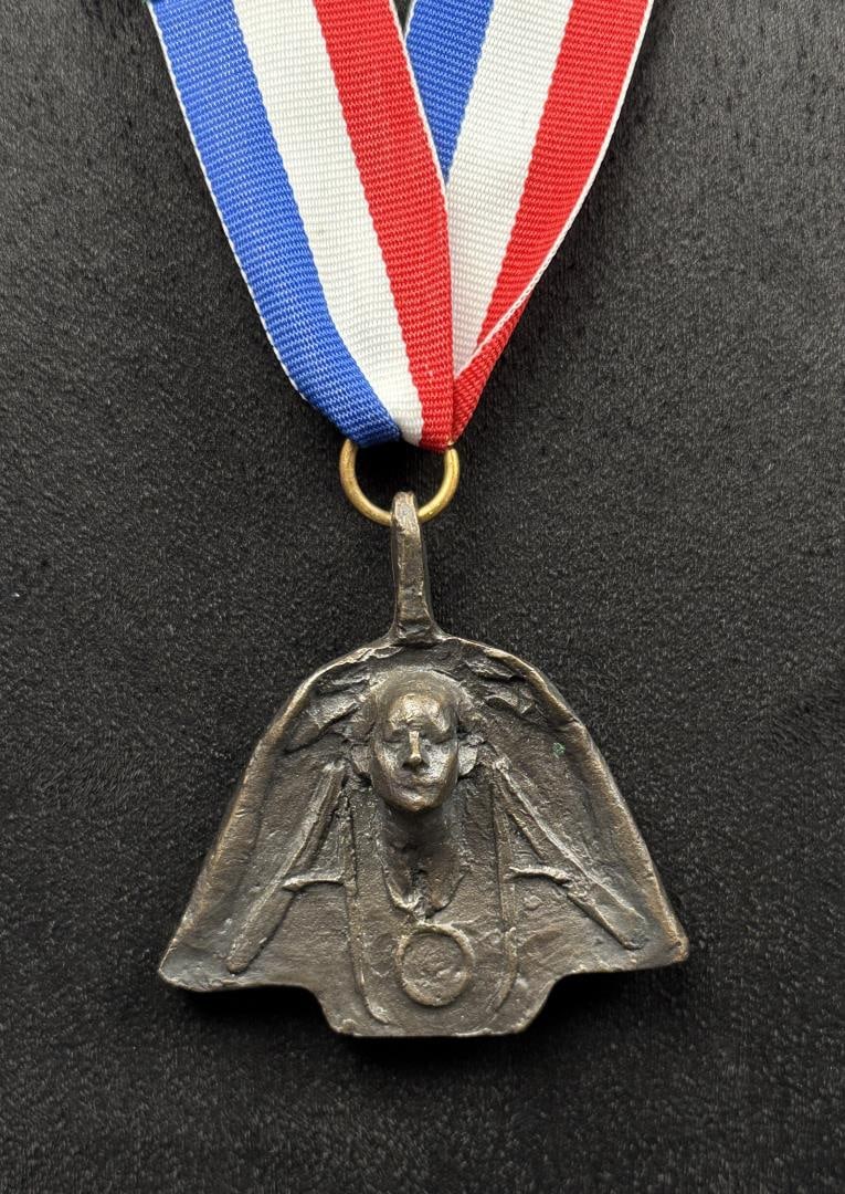 George Carlson Artists of America Bronze Medal: 17 7/8" long on ribbon. George A. Carlson (Born 1940) is active/lives in Idaho, Illinois, Colorado. George Carlson is known for Landscape painting, sculpture and drawing. George Carlson creates two-di