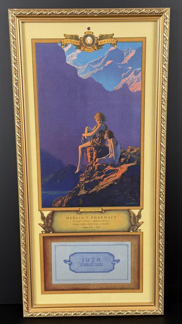 Contentment Edison Mazda Maxfield Parrish Calendar: Medlin Pharmacy Butte Montana. 1928. 9 3/4" by 20 3/8" framed.