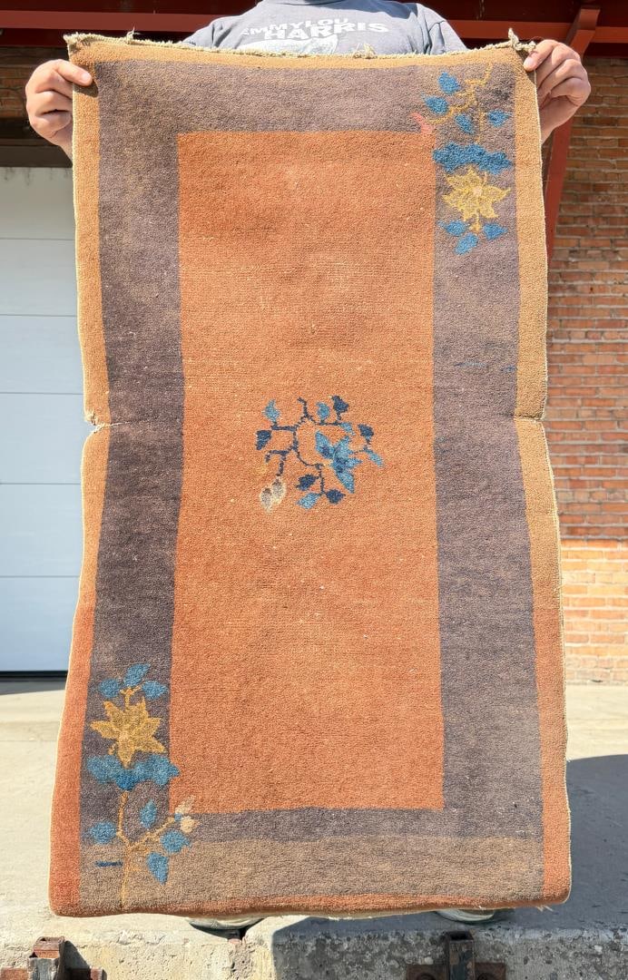 Art Deco Chinese Nichols Peking Rug: 25" by 46". Holes and tears throughout as shown.