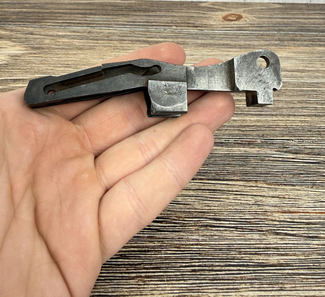 Winchester Model 1886 Carrier Assembly: Cracked as shown.