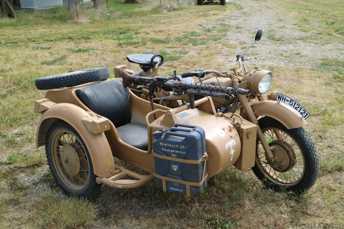 1970s Soviet Union Dnepr Motorcycle: Clone design of BMW R75. Runs, but requires attention after sitting for over 10 years. Afrika Korps paint job and replica data plates. Dummy MG-42, Dummy MP-40. Original Wehrmacht Jerry can. Since the