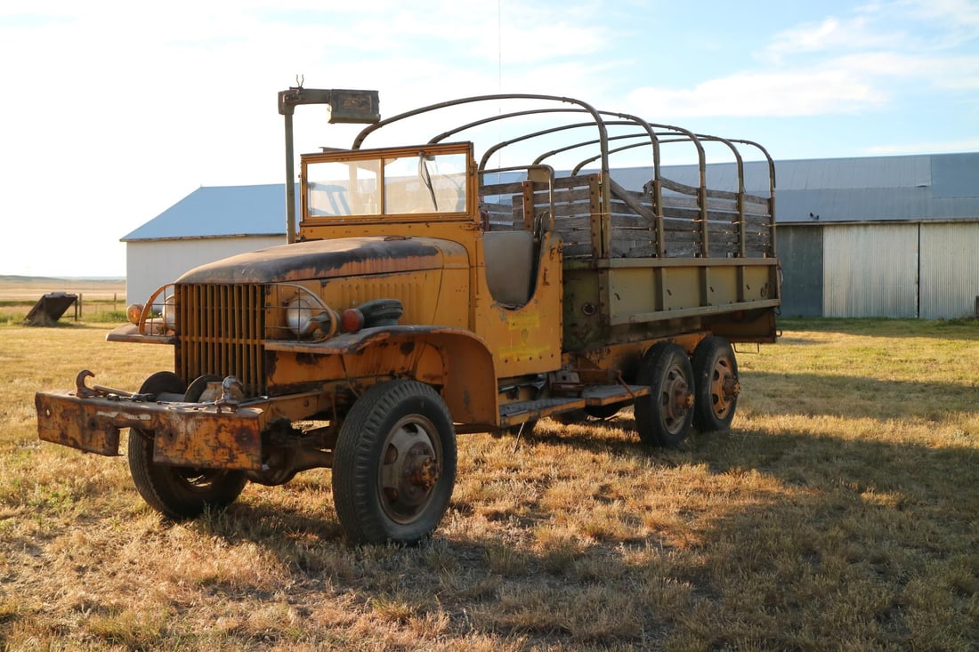 WW2 1944 Yellowstone National Park GMC CCKW Truck: Ran when parked, Beautiful composite cargo bed, Needs floor, All wood for racks, All top bows, 4 new tires, Locks for spare and tool box, Ring mount, Shovel and pick mattock. Comes with Clean Montana