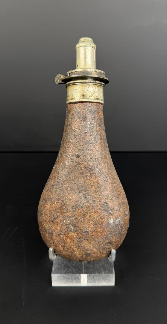 James Dixon & Sons Leather Nickel Powder Flask: 8" long. Missing leather covering.
