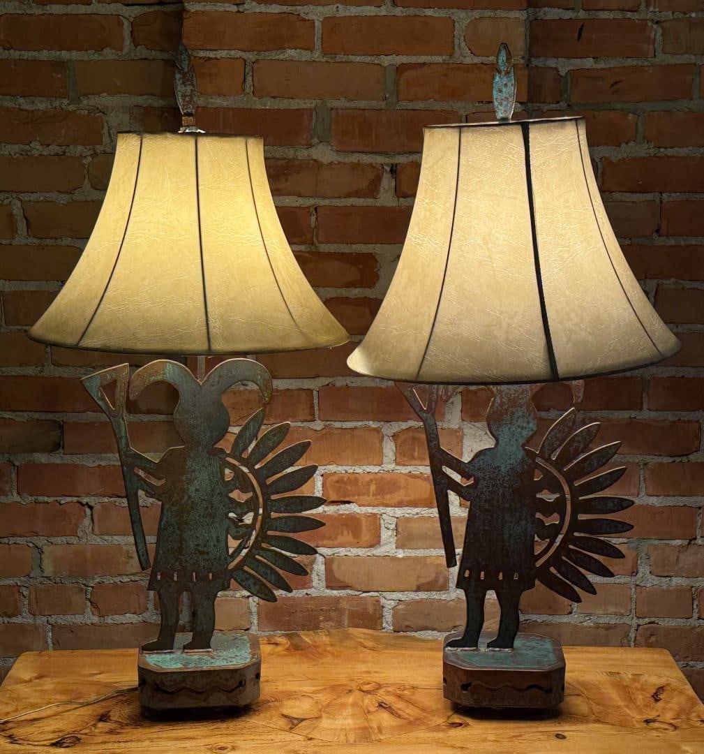 Southwest Patinated Steel Kokopelli Dancer Lamps: Each is 33 1/2" tall, 17" diameter with shade.