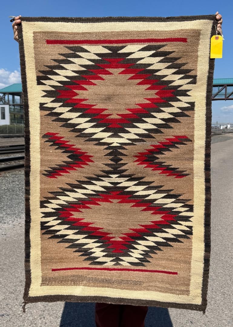 Navajo Indian Ganado Eye Dazzler Rug: 33" by 49 1/2". Comes with Old Pawn Tag as shown. A. Vartabedian & Son was a historical jewelry and repair business previously located in the Flatbush area of Brooklyn, New York. The business was well