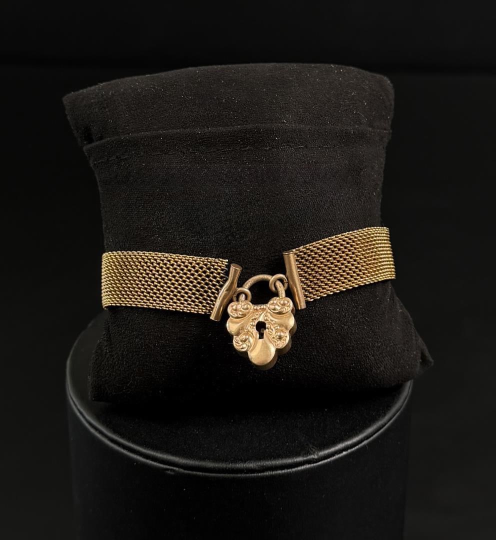 Victorian Gold Filled Mesh Heart Bracelet: Seed pearls, opal hearts and arrow slider charm bracelet. 7 1/2" inner circumference as shown. 16.20 grams.