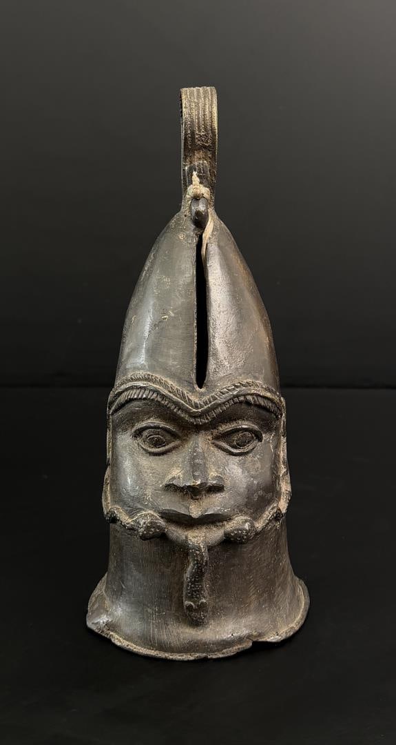 Yoruba Nigeria Lower Niger Bronze Omo Face Bell: 9 1/8" tall, 4" diameter.