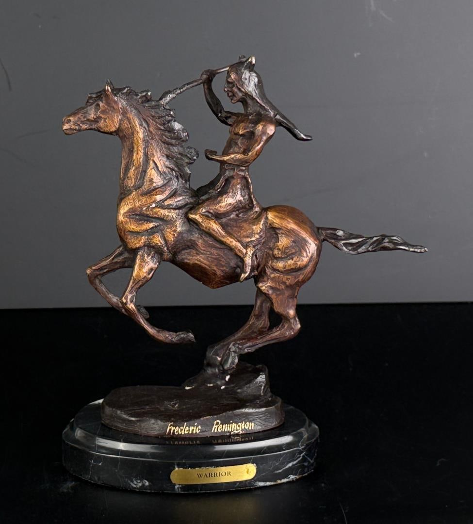 Frederic Remington Warrior Bronze: Title is Warrior. 8 7/8" by 7 7/8" by 3 5/8". Frederic Sackrider Remington (1861 - 1909) was active/lived in New York, Kansas, Connecticut. Frederic Remington is known for Western painting and