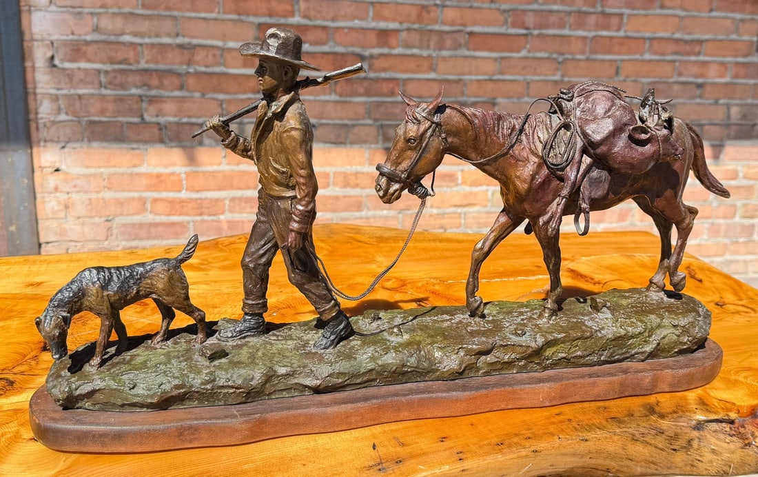 Earle Erik Jack's Luck Bronze: Title is Jack's Luck. 23 3/8" by 11 1/2" by 5". Edition 27 of 35. Condition: the deer on the back of the horse has a bent antler. Earle Erik Heikka (1910 - 1941) was active/lived in Montana. Earle Hei