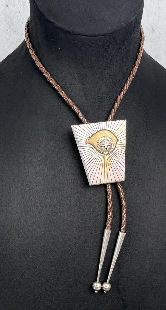 Joe Willeto 14k Sterling Silver Bolo Tie: 20 3/4" long as displayed. Silver pieces weigh 35.87 grams.