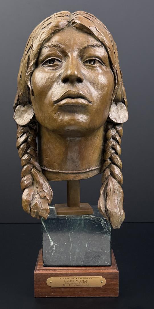 Richard Greeves Salish Woman Bronze: Title is Corps of Discovery Salish Woman September 4th, 1805. 16 1/4" by 7 7/8" by 6 7/8". Edition 1/30. Richard Vernon Greeves (Born 1935) is active/lives in Wyoming, Missouri. Richard Greeves is kno