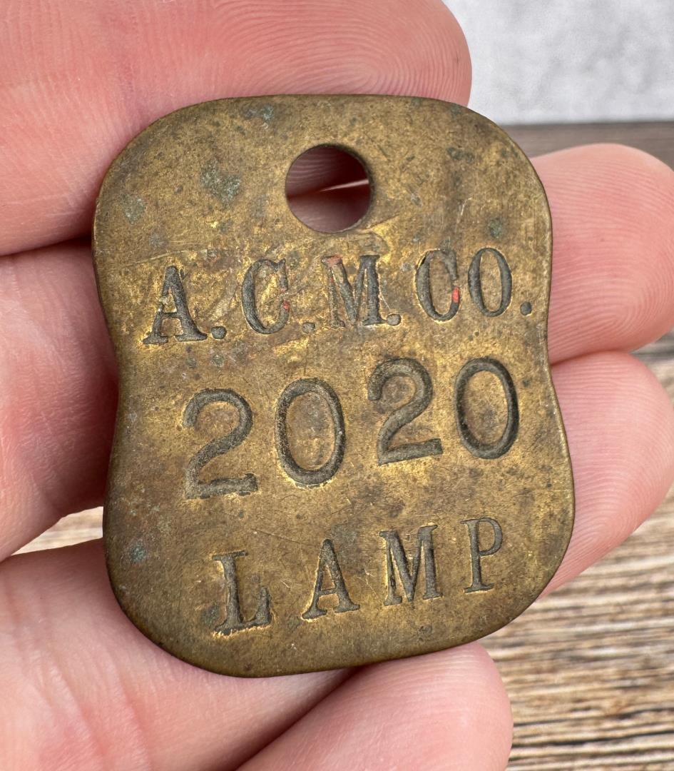 Anaconda Copper Mining Company Tool Check: Tool check tag for a Carbide Lamp.