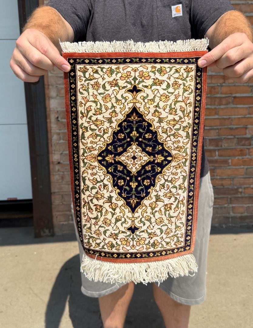 Qom Qum Silk Persian Oriental Prayer Rug: 12 1/2" by 19 1/2". Tag on back indicates it was sold by Bazaar Ahtamara Ltd. Sti, a Turkish rug dealer headquartered in Adana, Turkey.